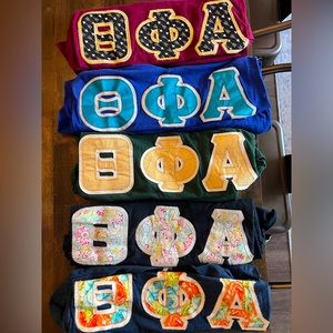 Theta Phi Alpha Letters
